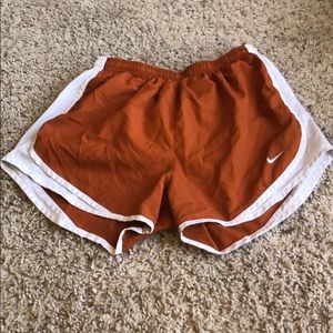 Burnt orange Nike tempo shorts